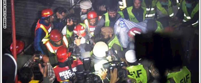 باکستان: حريق هائل بأحد المراکز التجارية في لاهور يخلف عشرات الضحايا