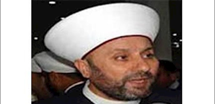 مفتي العراق يهاجم إيران والمليشيات الشيعية من القاهرة مساجد السنّة تُحرق وتُرفع عليها صور خامنئي