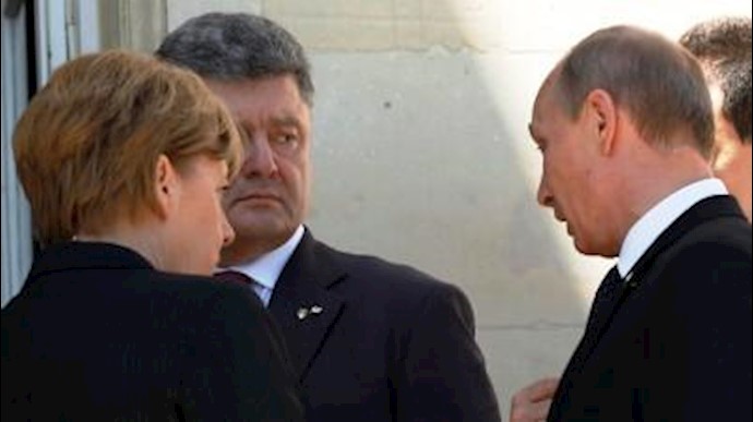 أول لقاء بين بوتين ورئيس أوکرانيا المنتخب