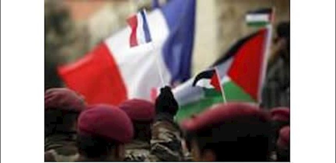 عشرات الفلسطينيين ينظمون وقفة تضامنية مع فرنسا وسط رام الله