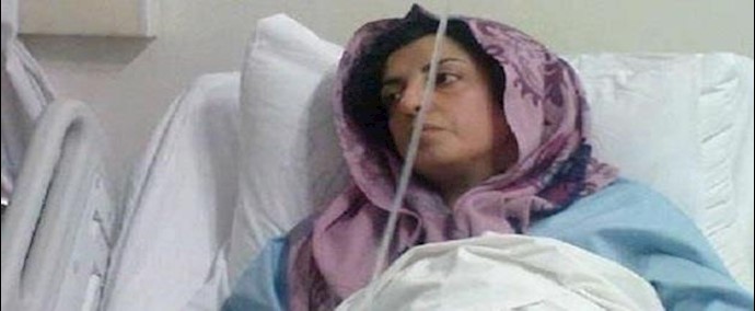 تکبيل الأيدي والأرجل للسجينة السياسية ”نرجس محمدي” بالسرير في المستشفی
