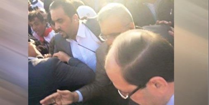 زيارة المالکي لساحة التحرير ببغداد تنتهي بالسباب والرشق بالأحذية