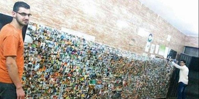 جدارية «50 ألف صورة شهيد» لفنان سوري شاب