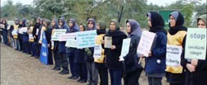 مئات الحقوقيين يدينون أکاذيب النظام الإيراني ضد سکان “ليبرتي”