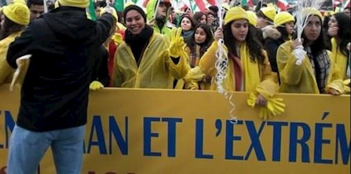 تقرير عن تظاهرة الايرانيين الحاشدة في باريس حين زيارة ملا روحاني