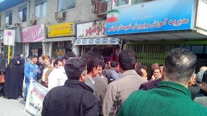 بالصور.. نهب قوات الحرس الإيراني أموال الأهواز يفجر الاحتجاجات بإيران