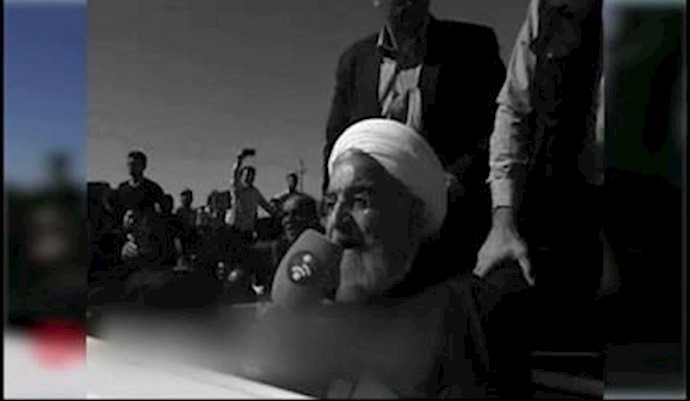 احتجاجات المواطنين المنکوبين بالزلزال في کرمانشاه علی أکاذيب حسن روحاني بشأن الإغاثات الحکومية