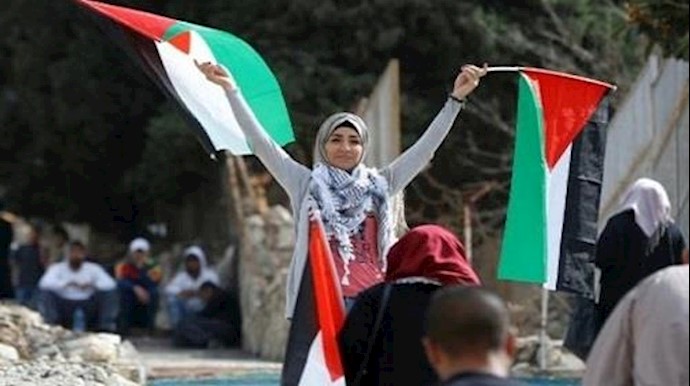 الاف الفلسطينيين يتظاهرون في الذکری المئوية لوعد بلفور