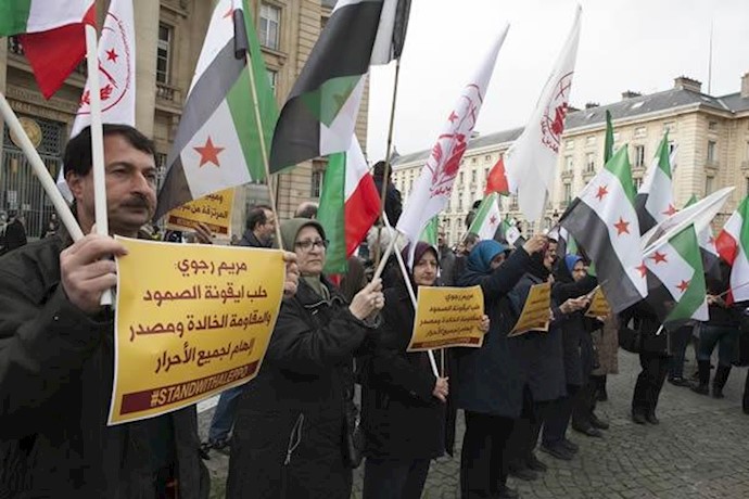 مظاهرات بمناسبة السنة السادسة لبداية الثورة السورية في باريس بحضور اعضاء وانصار المقاومة الإيرانية(صور+فيديو)