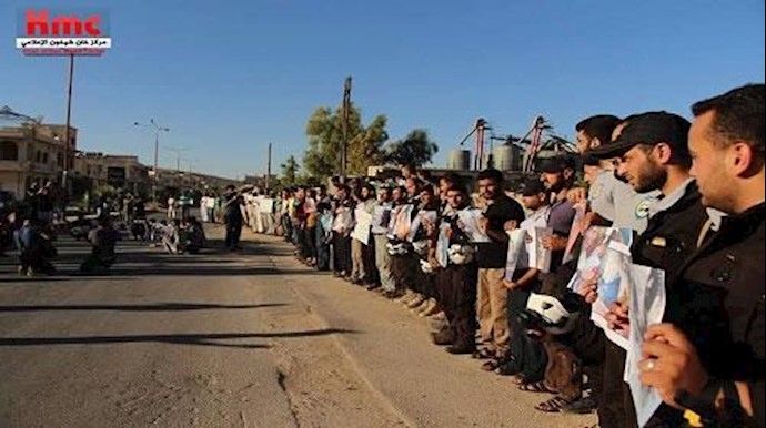 خان شيخون.. وقفة احتجاجية بعد مرور 100 يوم علی مجزرة الکيماوي