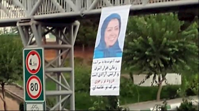 طهران: تعليق لافتة کبيرة بشعار قد ولی عهد الملالي+ فيديو