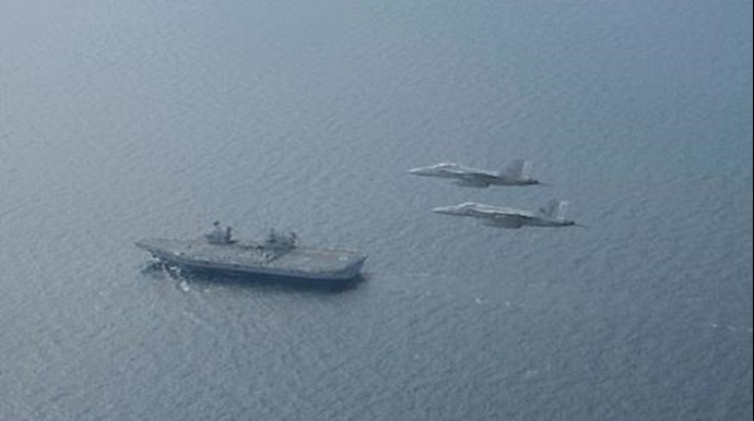 طائرة إيرانية من دون طيار تقترب من مقاتلة أميرکية