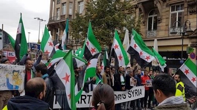 سوريون يتظاهرون في فرانکفورت رداً علی مظاهرة مؤيدة للأسد+ فيديو